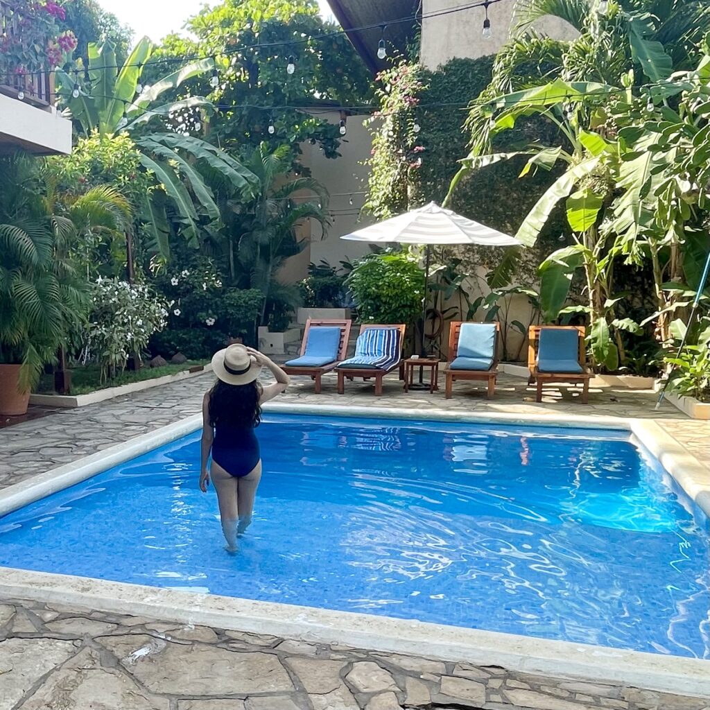 Pool and lush gardens at Hotel Secret Garden in Granada, Nicaragua. 